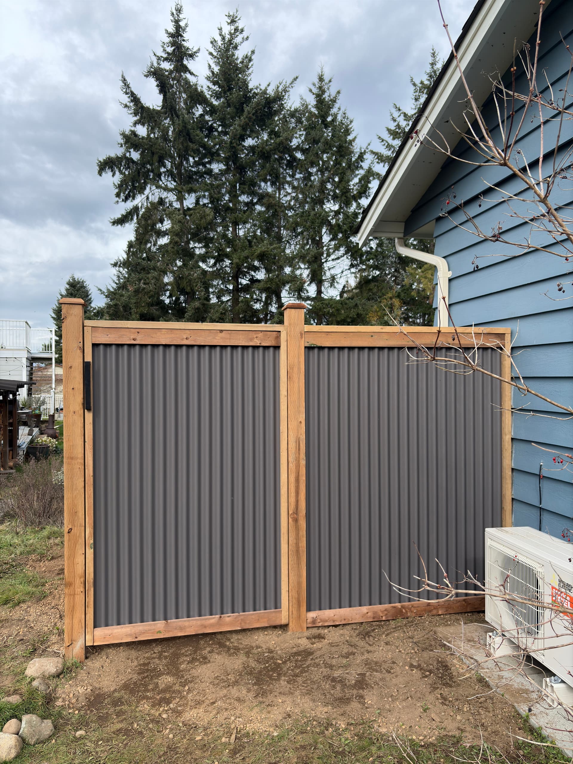Gallery photos for Striking Corrugated Metal Fence Installation in Lantzville: Image #1
