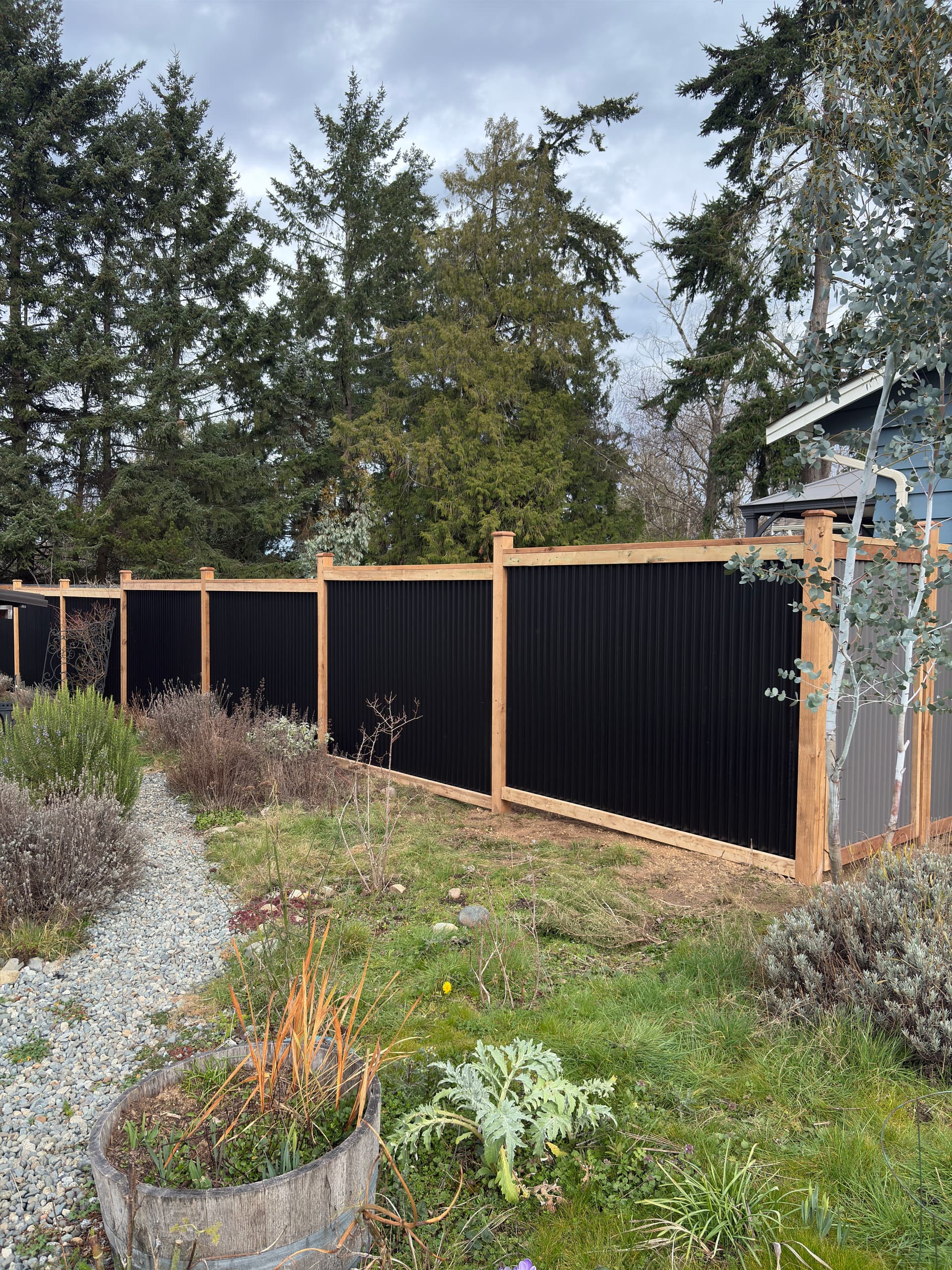 Striking Corrugated Metal Fence Installation in Lantzville image